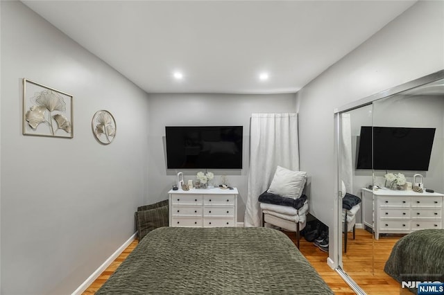 61 Sabina St, Little Ferry, NJ 07643 - bedroom with light wood-type flooring and recessed lighting