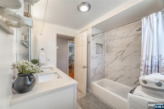 61 Sabina St, Little Ferry, NJ 07643 - full bathroom with shower / bath combo, a sink, double vanity, and washer / clothes dryer