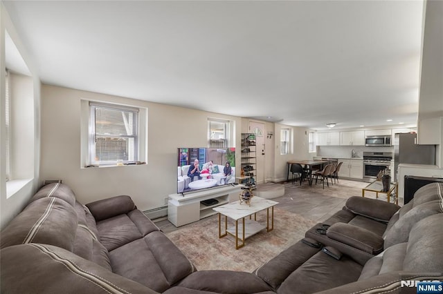 61 Sabina St, Little Ferry, NJ 07643 - living area with baseboard heating and recessed lighting