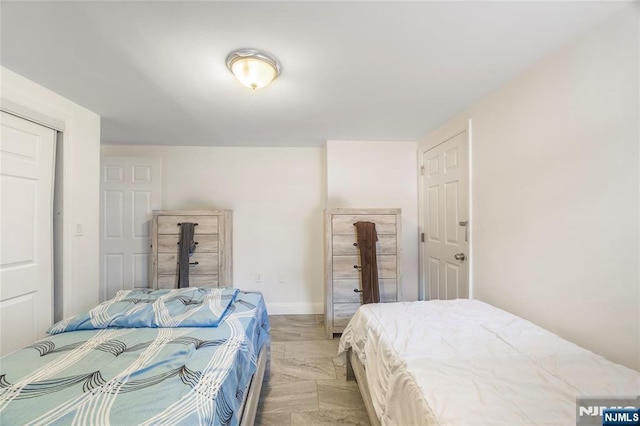 61 Sabina St, Little Ferry, NJ 07643 - bedroom featuring baseboards