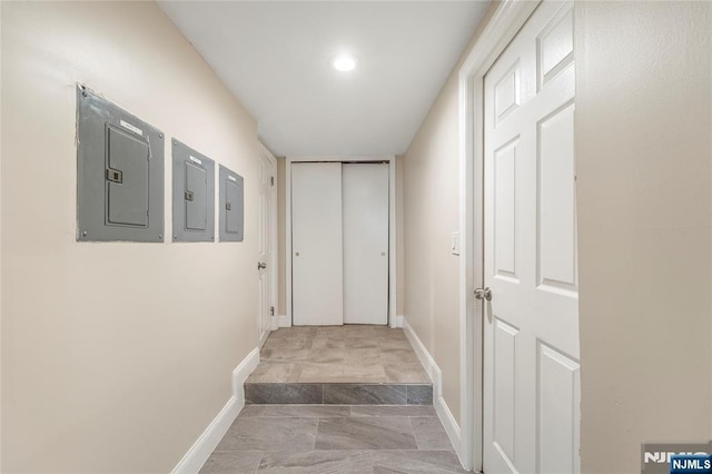 61 Sabina St, Little Ferry, NJ 07643 - hallway with electric panel, baseboards, and marble finish floor