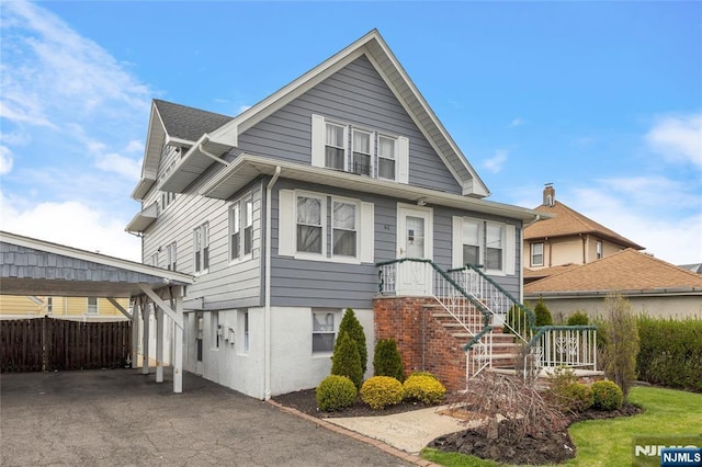 61 Sabina St, Little Ferry, NJ 07643 - view of front facade featuring fence