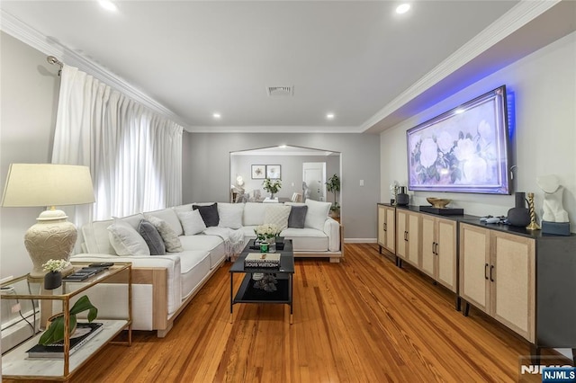 61 Sabina St, Little Ferry, NJ 07643 - living room with recessed lighting, light wood-type flooring, visible vents, and ornamental molding