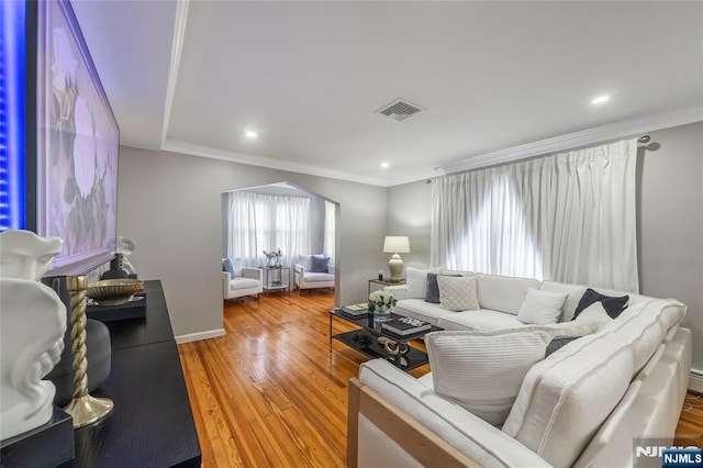 61 Sabina St, Little Ferry, NJ 07643 - living room with wood finished floors, visible vents, recessed lighting, and ornamental molding