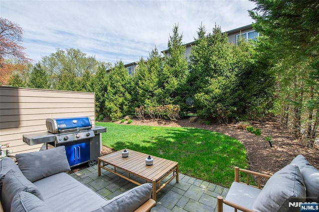 view of patio / terrace with area for grilling and an outdoor hangout area