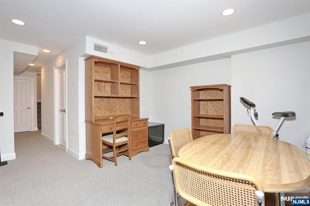 dining area featuring light carpet, baseboards, visible vents, and recessed lighting