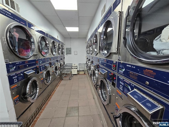 270 Marin Blvd Unit 12-O, Jersey City, NJ 07302 - communal laundry room featuring stacked washer / dryer and washer and dryer