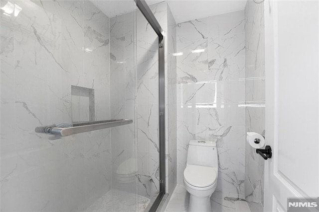 full bathroom featuring a marble finish shower, toilet, and marble finish floor
