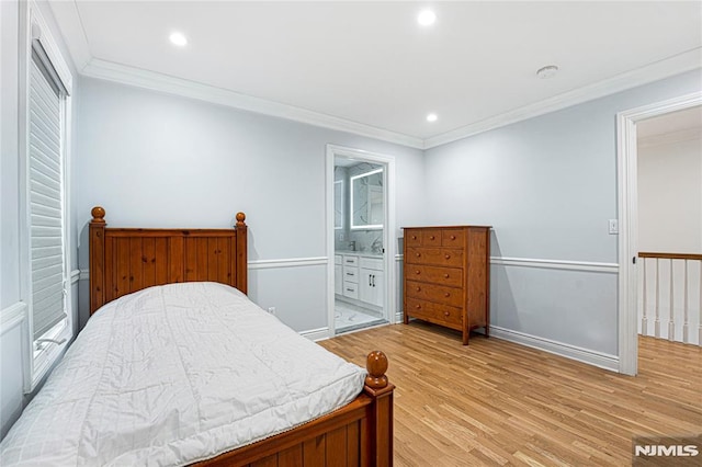 bedroom featuring crown molding, recessed lighting, and light wood-type flooring