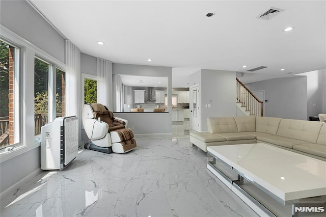 living room featuring stairway, marble finish floor, recessed lighting, and visible vents