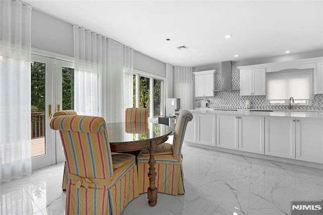 dining room with recessed lighting, visible vents, french doors, and marble finish floor