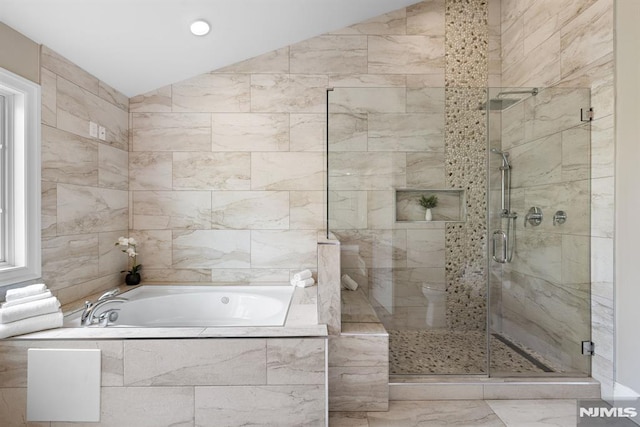 bathroom featuring a shower stall, a garden tub, recessed lighting, and marble finish floor