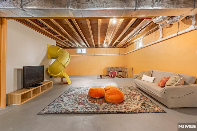 interior space featuring finished concrete floors