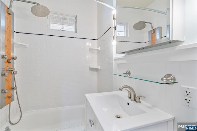 full bath with vanity and bathtub / shower combination