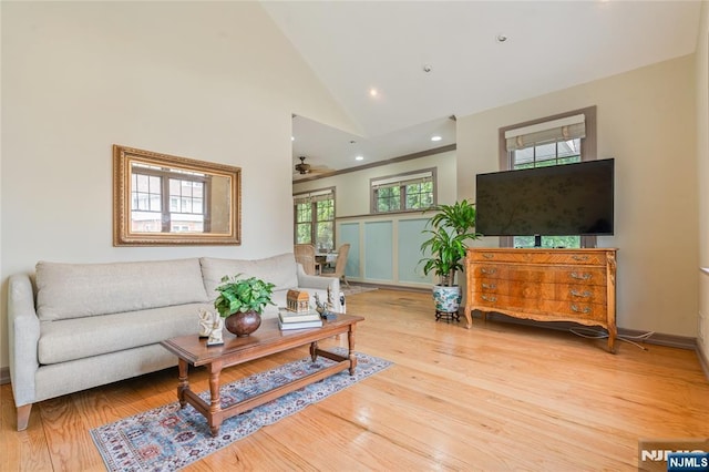 living area featuring recessed lighting, wood finished floors, a ceiling fan, and high vaulted ceiling