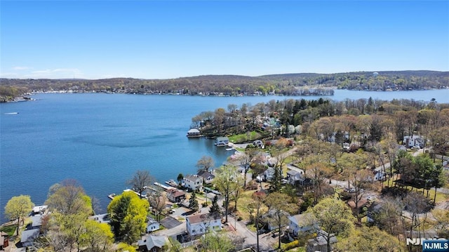 bird's eye view with a water view and a residential view