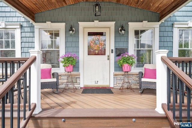 doorway to property with a porch