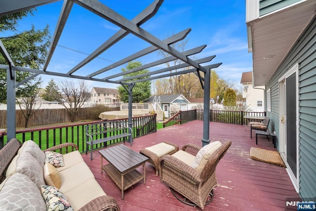 wooden deck with a residential view, outdoor lounge area, a pergola, a lawn, and a fenced backyard