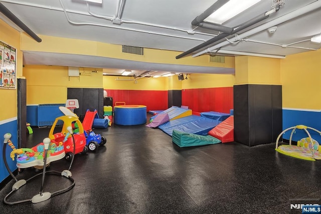 recreation room with rubber floors