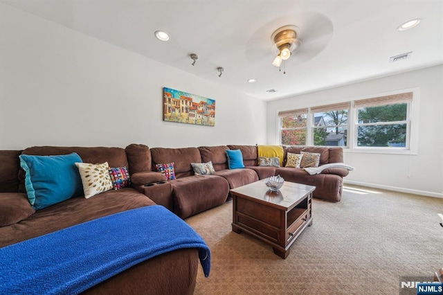 carpeted living area with ceiling fan, baseboards, visible vents, and recessed lighting