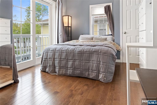 bedroom featuring wood finished floors