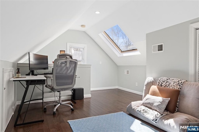 office area with wood-type flooring, baseboards, visible vents, and lofted ceiling with skylight
