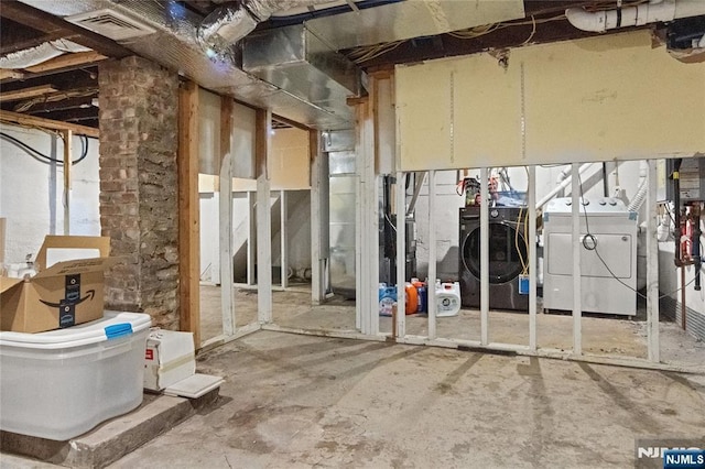 miscellaneous room with separate washer and dryer