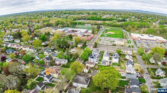 birds eye view of property with a residential view