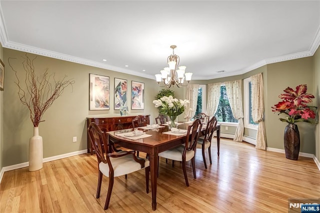 dining area featuring recessed lighting, light wood finished floors, ornamental molding, baseboards, and a notable chandelier