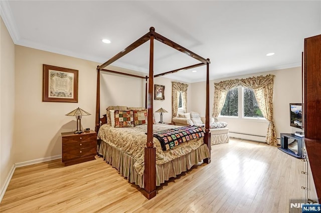bedroom featuring baseboards, recessed lighting, light wood-style floors, baseboard heating, and crown molding