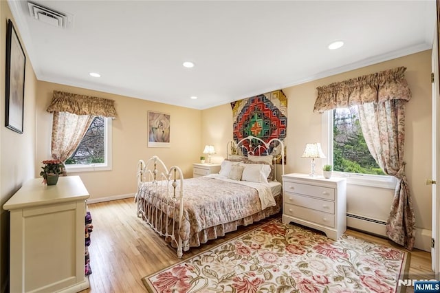 bedroom featuring light wood-style floors, baseboards, ornamental molding, visible vents, and recessed lighting