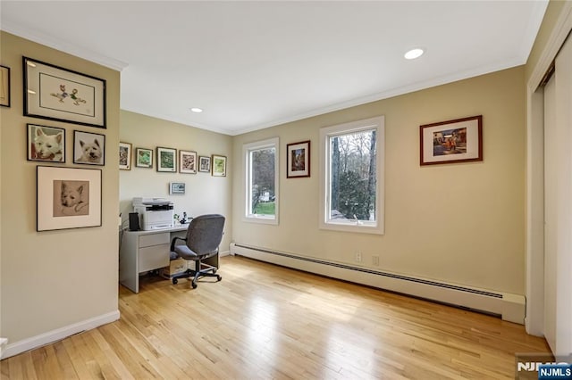 office with recessed lighting, a baseboard heating unit, light wood-type flooring, crown molding, and baseboards