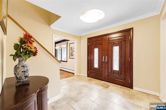 foyer with a baseboard radiator, baseboards, crown molding, and stone finish flooring