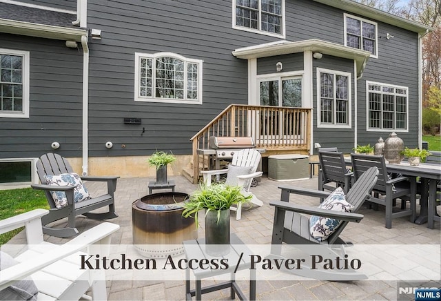 21 Flintlock Rd, Montvale, NJ 07645 - exterior space featuring outdoor dining area and a fire pit