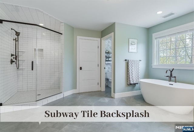 21 Flintlock Rd, Montvale, NJ 07645 - bathroom featuring tile patterned floors, baseboards, visible vents, a soaking tub, and a stall shower