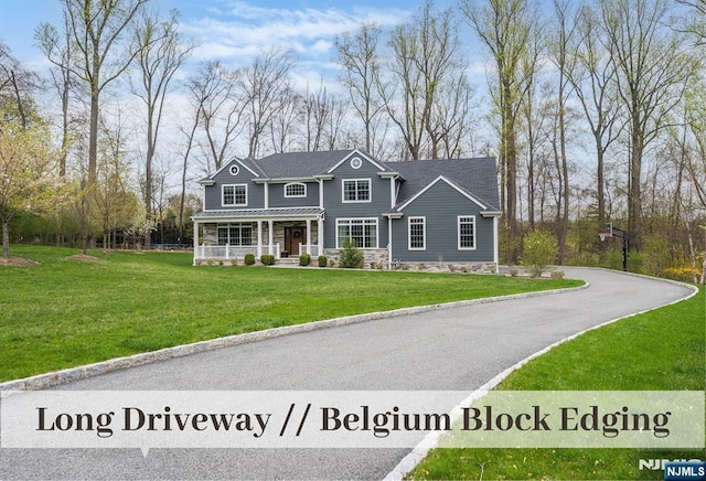 21 Flintlock Rd, Montvale, NJ 07645 - craftsman inspired home featuring covered porch and a front yard