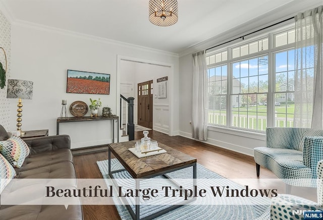 21 Flintlock Rd, Montvale, NJ 07645 - living area with baseboards, ornamental molding, wood finished floors, and stairway