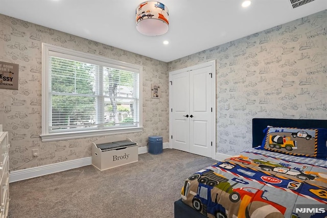 carpeted bedroom featuring wallpapered walls, visible vents, baseboards, and recessed lighting