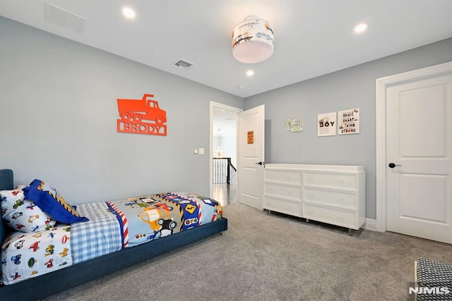 carpeted bedroom featuring visible vents and recessed lighting
