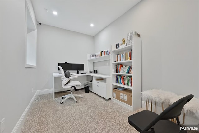 home office with baseboards, recessed lighting, and light colored carpet