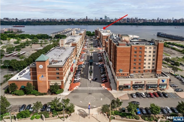 bird's eye view with a water view and a city view