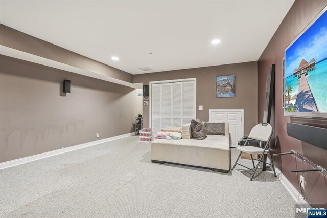 150 Blue Heron Dr, Secaucus, NJ 07094 - living area featuring carpet flooring, baseboards, and recessed lighting