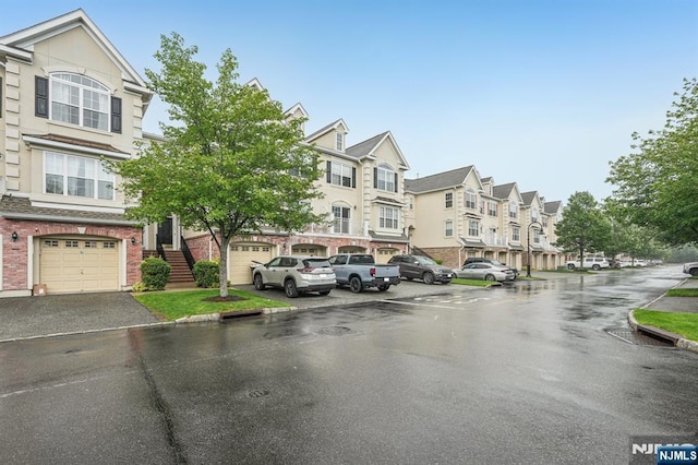 150 Blue Heron Dr, Secaucus, NJ 07094 - view of asphalt street featuring a residential view and curbs