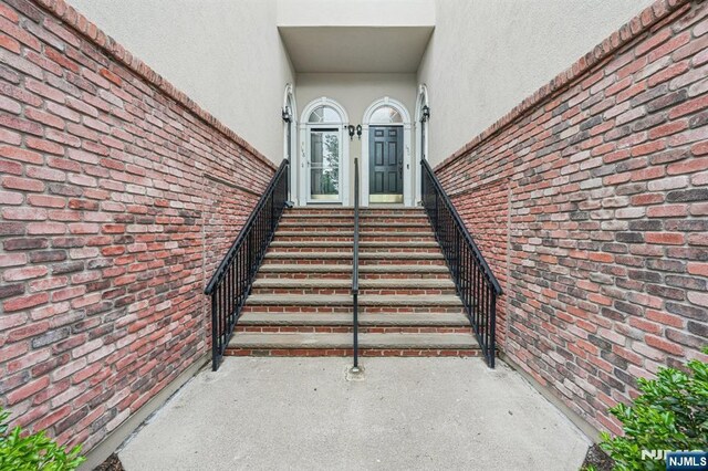 150 Blue Heron Dr, Secaucus, NJ 07094 - entrance to property featuring stucco siding and brick siding
