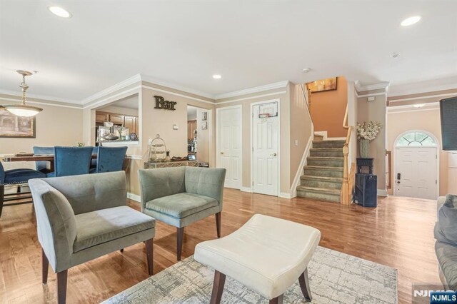 150 Blue Heron Dr, Secaucus, NJ 07094 - living room featuring stairway, ornamental molding, baseboards, recessed lighting, and light wood-style flooring