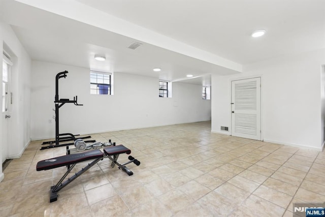 exercise area featuring recessed lighting and visible vents