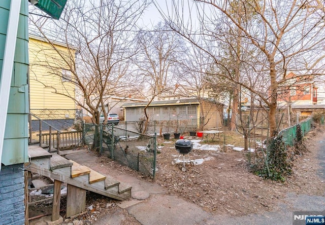 view of yard with fence