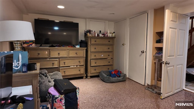 bedroom featuring recessed lighting