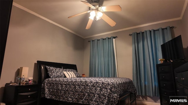 bedroom with ceiling fan and crown molding