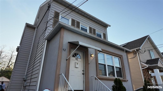 view of front of property featuring stucco siding